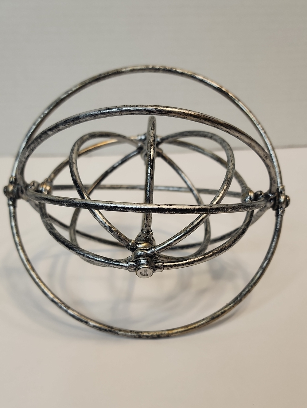 Decorative Metal Orb Sculpture in Silver Collapses To Flat 6" Diameter